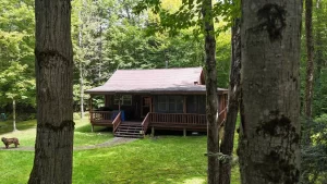 Serene Cabin Log with Modern Amenities on 8 Acres. $134,900
