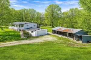 Country Property on 15.81 Acres with Stocked Pond. $225,000